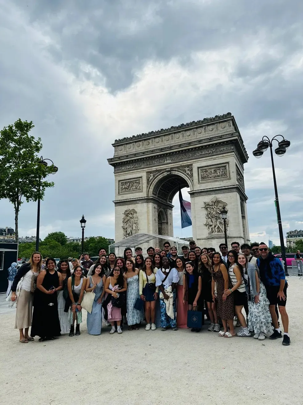 University Singers in front of Arch