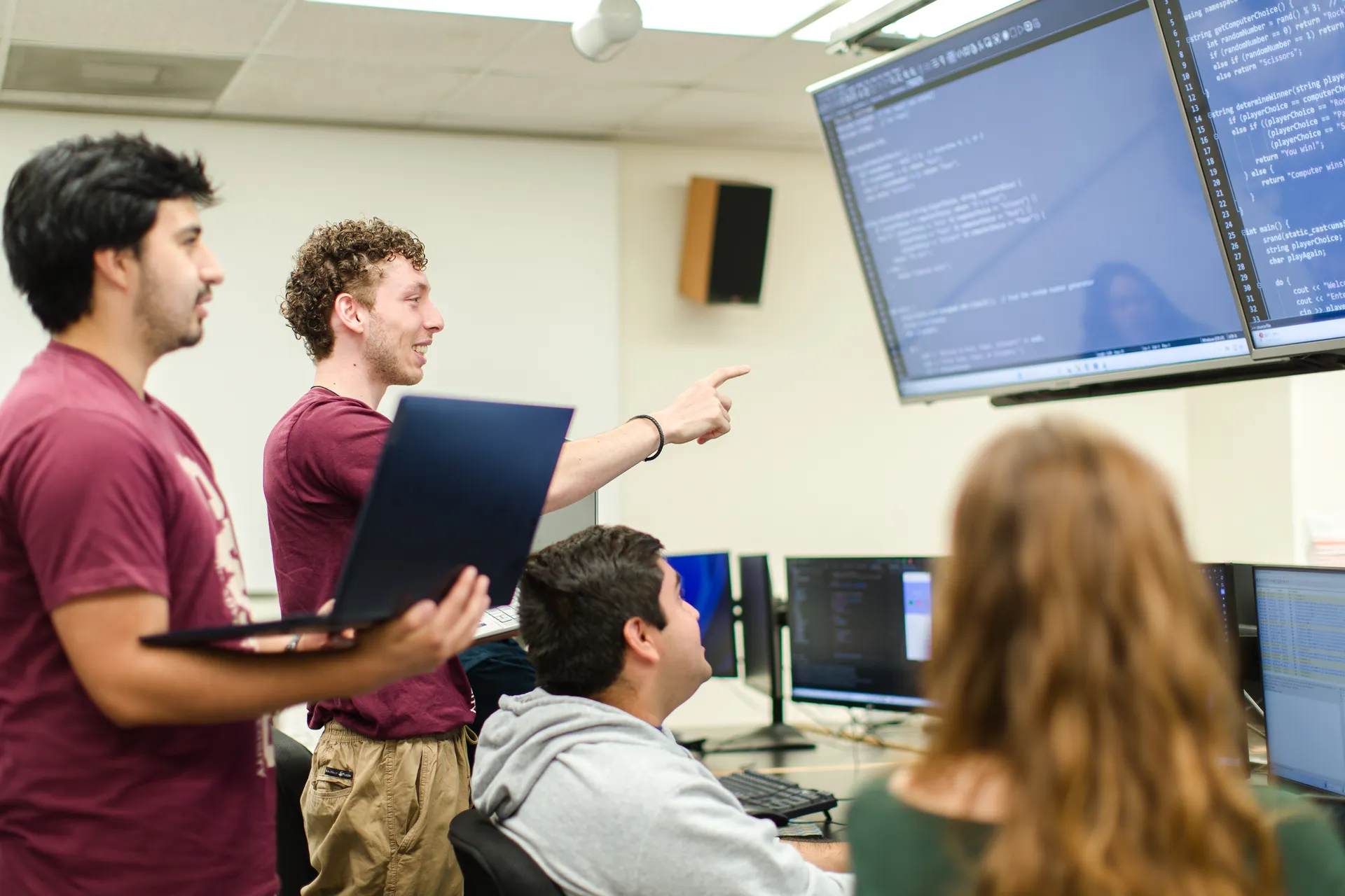 CS Students working on computers