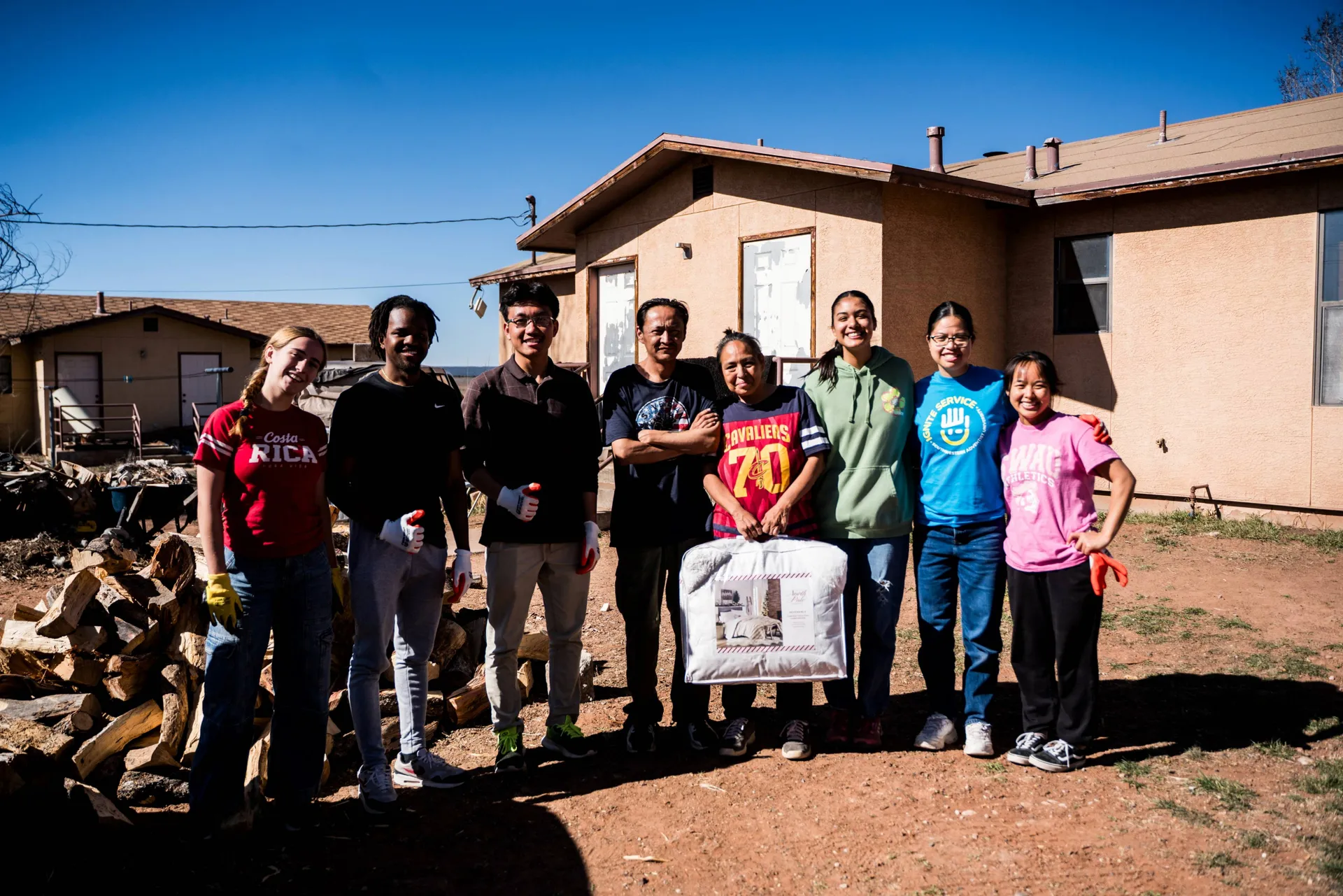 Group photo by house