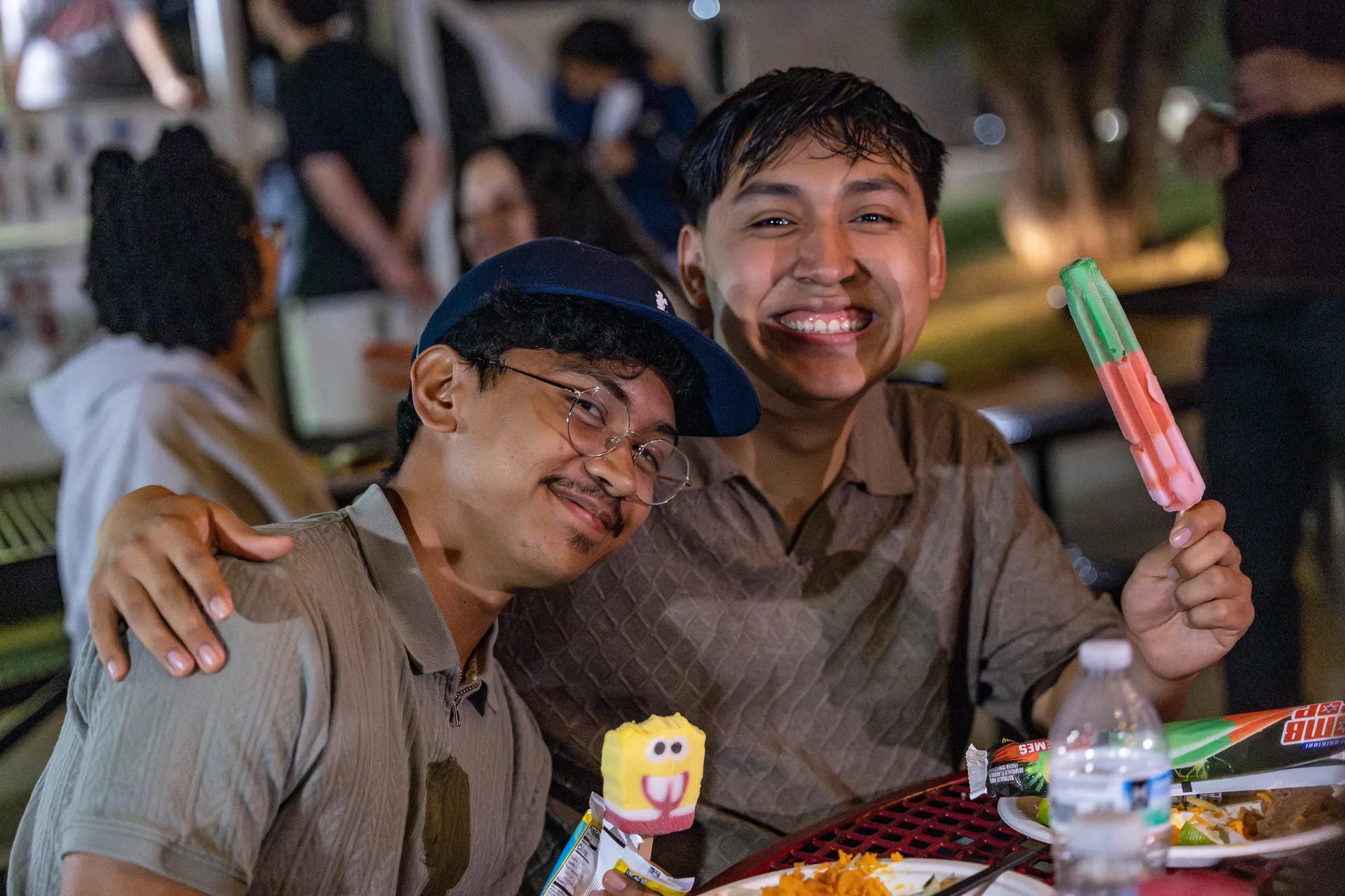 guys with ice cream and popsicles