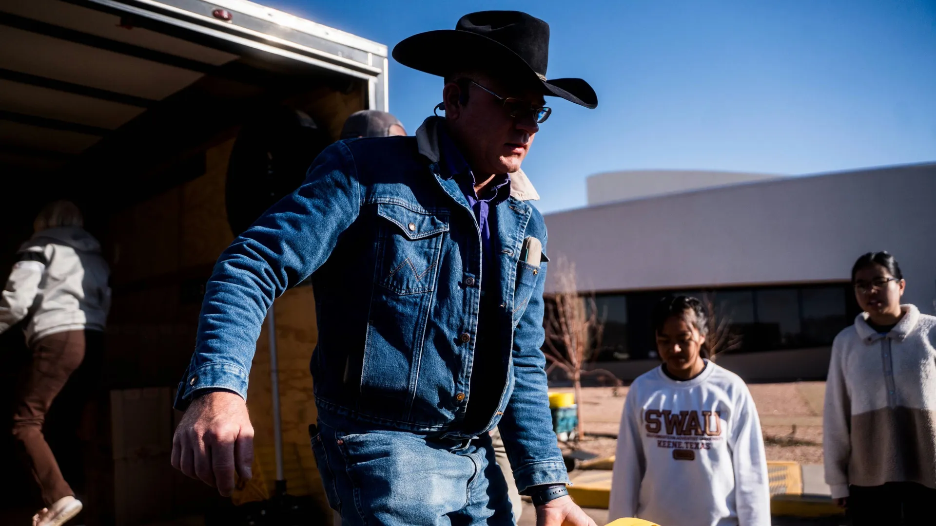 Man walking out of trailer