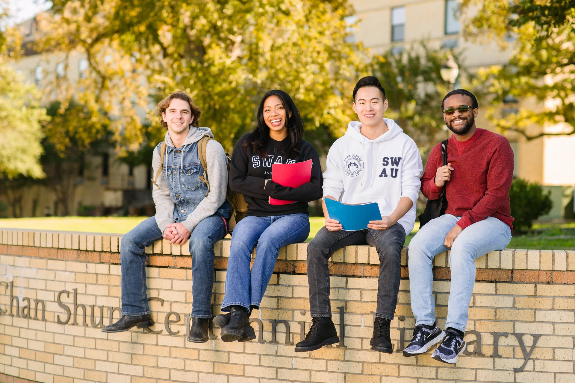 Students sitting on Chan Shun Wall