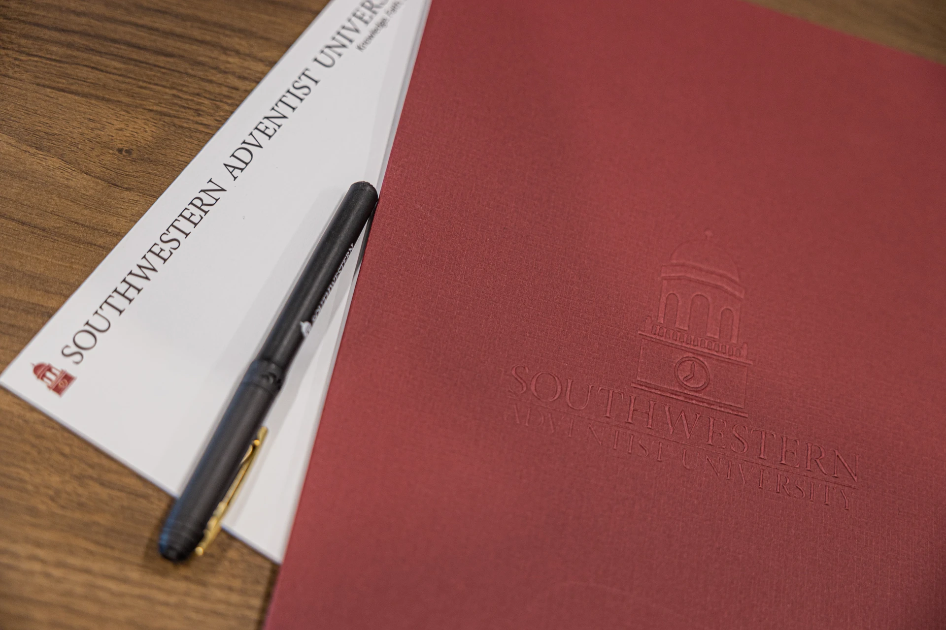 SWAU branded forms and folder