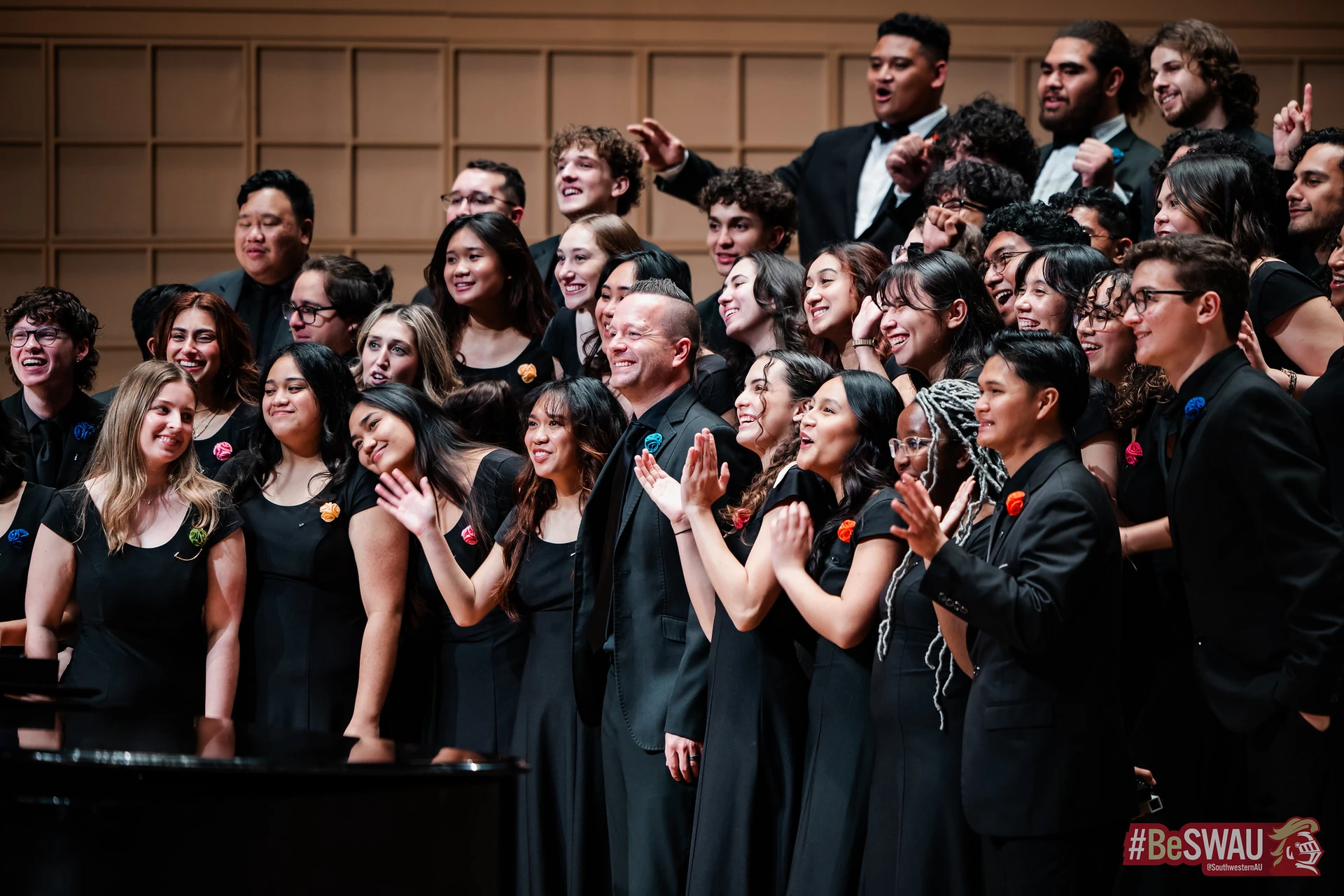 Singers pose for a group photos